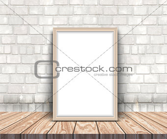 3D blank silver picture frame on a wooden table leaning against 