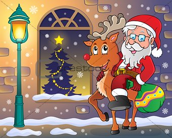 Santa Claus on reindeer in town