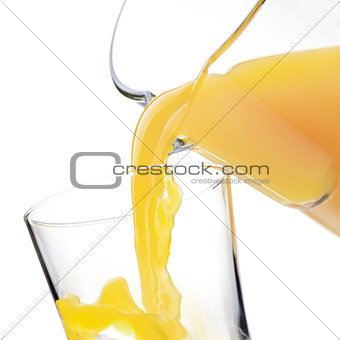 Pouring refreshing juice in a glass