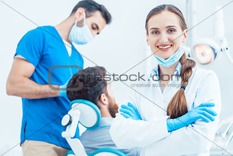 Portrait of a confident female dentist looking at camera in the