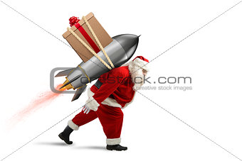 Fast delivery of Christmas gifts. Santa Claus ready to fly with a rocket