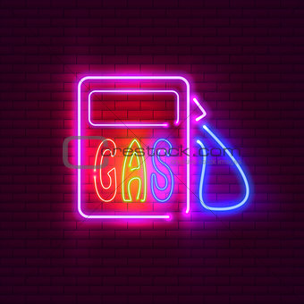 Gas station neon sign on brick wall. Vintage signboard