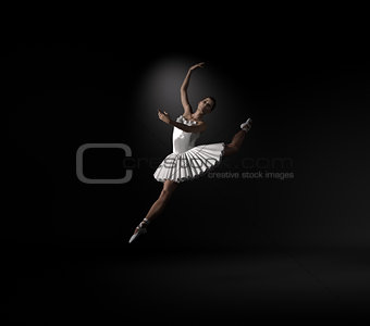 Young and beautiful ballerina with white tutu