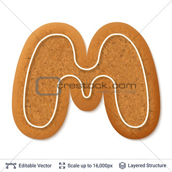 Gingerbread letter M isolated on white.