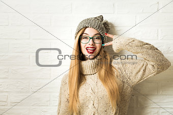 Trendy Hipster Girl in Winter Clothes Going Crazy