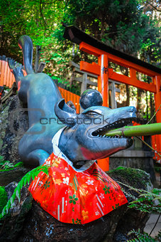 Fox purification fountain at Fushimi Inari Taisha, Kyoto, Japan