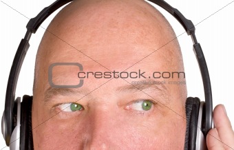 Male listening to music on headpohones
