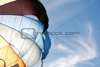 Parachute against blue sky
