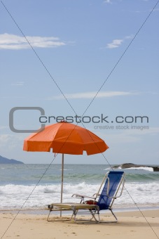 Chairs and parasol on beach