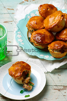Mini chicken, sherry and herb pies.style rustic