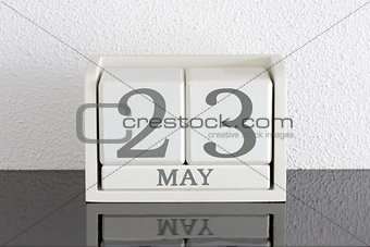 White block calendar present date 23 and month May