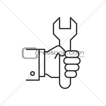 Hand holding wrench