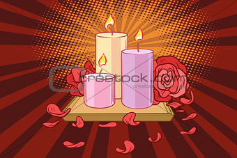 Romantic candles and rose petals