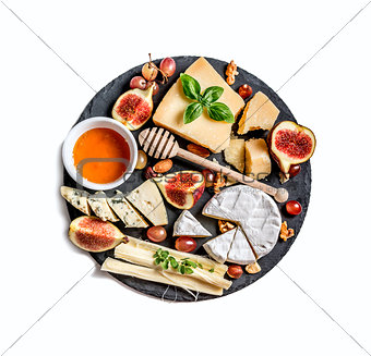 Cheese plate served with nuts and honey