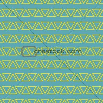 Tile vector pattern with yellow triangles on pastel mint green background