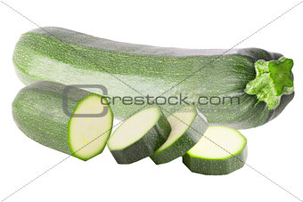 One courgette and slices isolated on white
