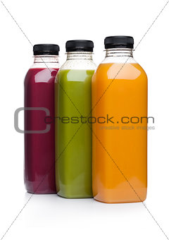 Bottles of healthy fruit juice smoothie