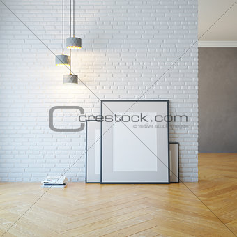 empty room with light and blank pictures