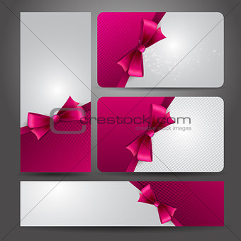 Holiday gift card  with red ribbons and bow.