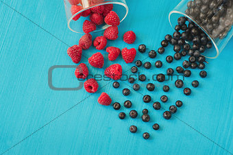 Heart shape of fresh raspberries and blueberries