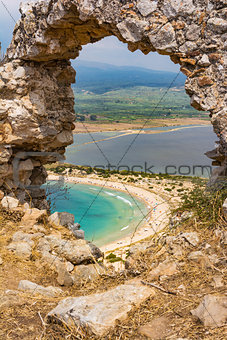View of Voidokilia beach and Divari lagoon in the Peloponnese region of Greece, from the Palaiokastro