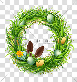 Easter wreath of green grass with eggs and rabbit ears