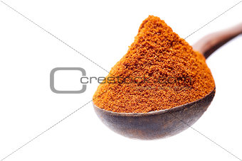 Shichimi pepper in Wooden spoon on white background,Blend of spices