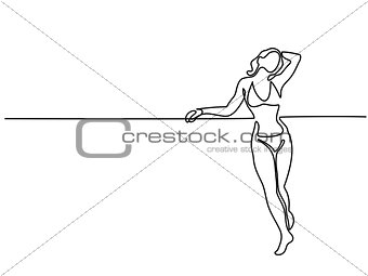 Happy sunbathing woman stretching