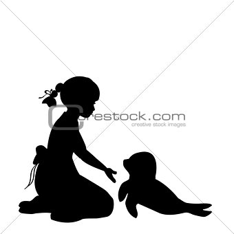 Silhouette girl sitting knees beckon seal pups .Protection seal