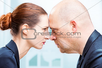 Man vs woman office confrontation
