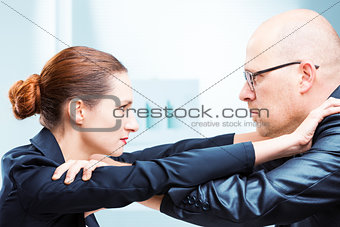Man vs woman office fighting in office