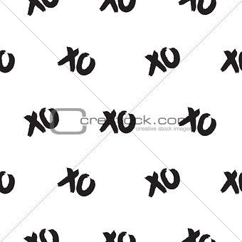Seamless pattern with xoxo words.