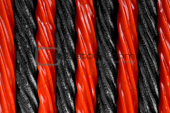 Alternating red and black licorice stripes.