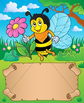 Small parchment and bee holding flower