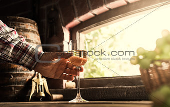 Wine expert tasting a glass of wine
