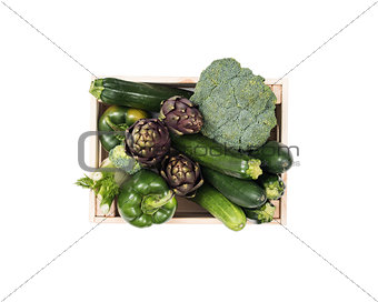 Fresh tasty vegetables in a wooden crate