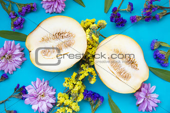 Two melons with flowers
