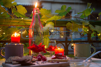 Candles on romantic table at late evening