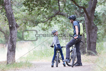 family biking in the park