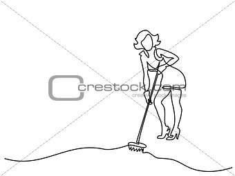 Young woman washes floor with mop