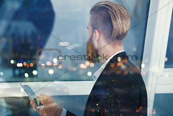 Businessman looks far for the future into the night. Concept of innovation and startup
