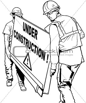 Two Building Workers Carrying Wooden Board