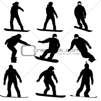 Set black silhouettes snowboarders on white background