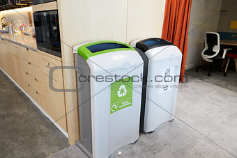 Recycling bins in a modern office kitchen