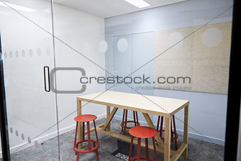 Small empty meeting room at a modern business premises