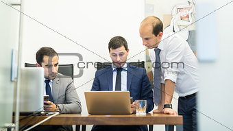 Corporate business team working in modern office.