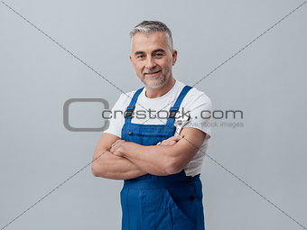 Plumber posing with a wrench