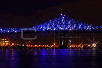 Luminous colorful interactive Jacques Cartier Bridge.