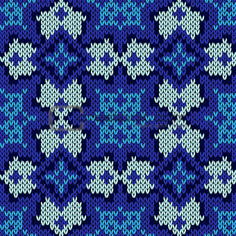 Seamless knitted blue ethnic pattern