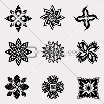 The vector set of heraldic decoration flowers